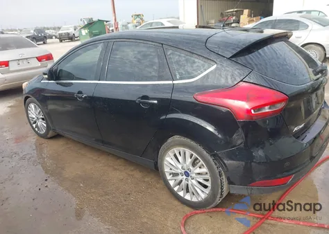 2016 Ford Focus Titanium z USA, uszkodzony, nr VIN 1FADP3N24GL395081